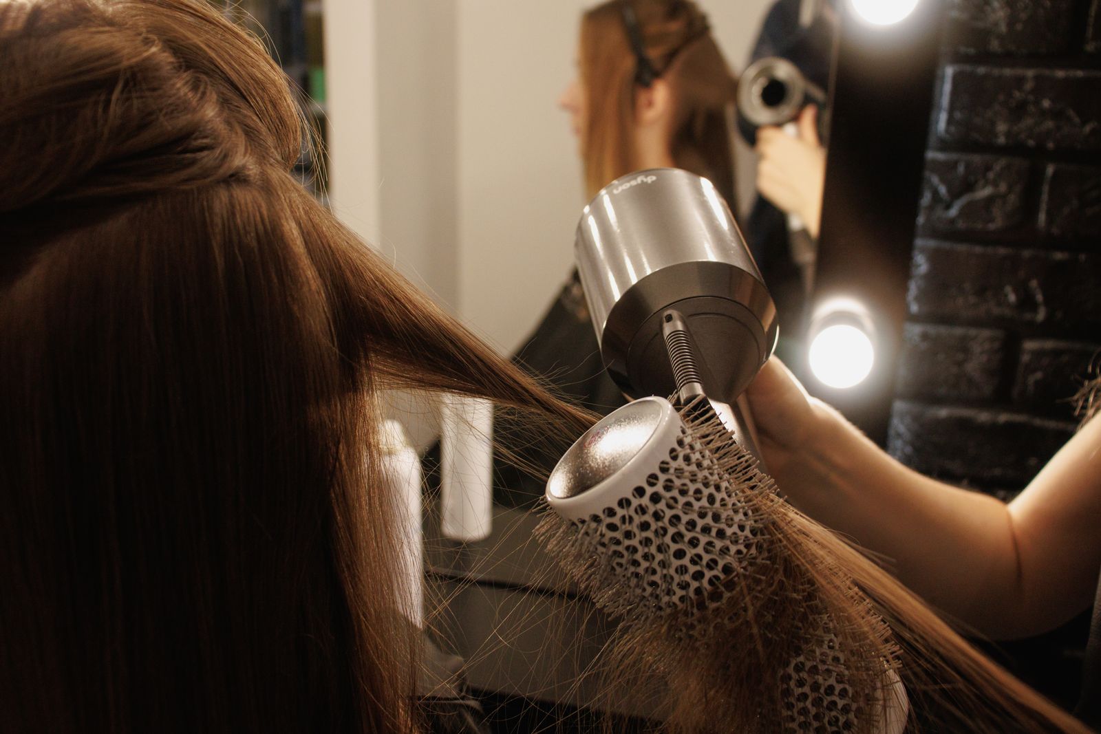 Editorial photograph of a blow-dry appointment